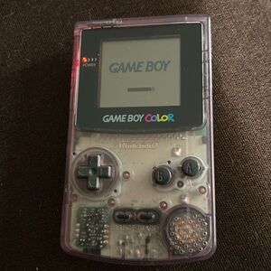 Nintendo GameBoy Color.   Purple console.
